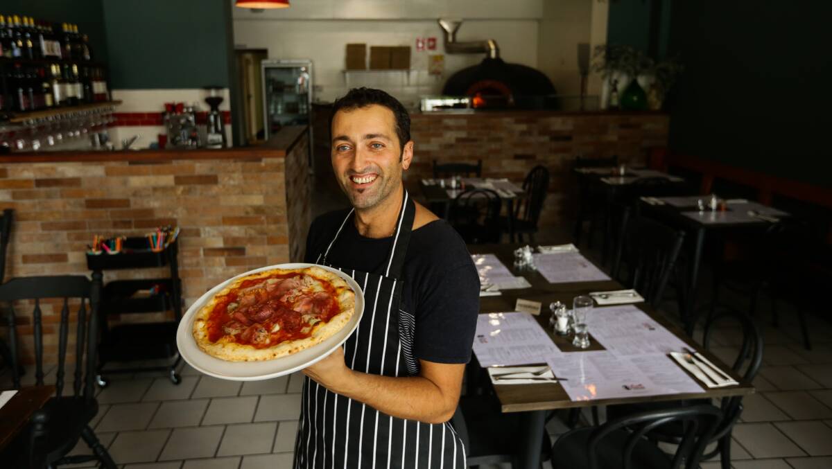A TASTE OF ITALY:  Ometto owner and pizza maker Giuseppe Maviglia who proudly makes authentic style pizza where the crust is all important. Picture Jonathan Carroll.