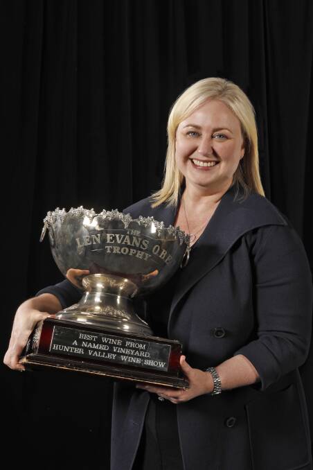 TROPHIES APLENTY:  Jane Tyrrell with the Len Evans Trophy which they won with their 2011 Stevens shiraz. Picture: Chris Elfes.