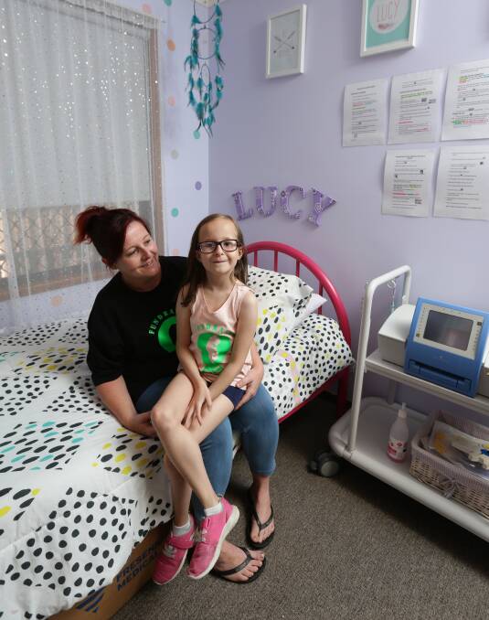Little trooper: Leigh Kenyon and her daughter Lucy Treharne's lives were turned upside down when her kidneys failed in October. Picture: Jonathan Carroll