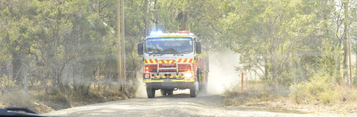 An RFS truck speeds to the scene. Picture: Lachlan Leeming 