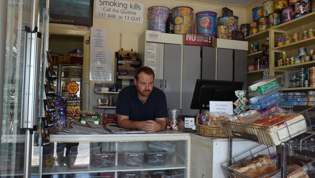 Mr Dowling at his Dungog store. 