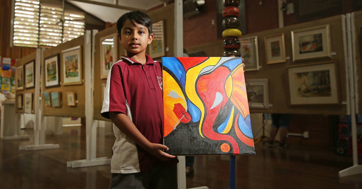 On show: Year three student Rudra Patel with his work, 'Ganesha'. More than 900 student artworks will be on show over the weekend. Picture: Marina Neil 