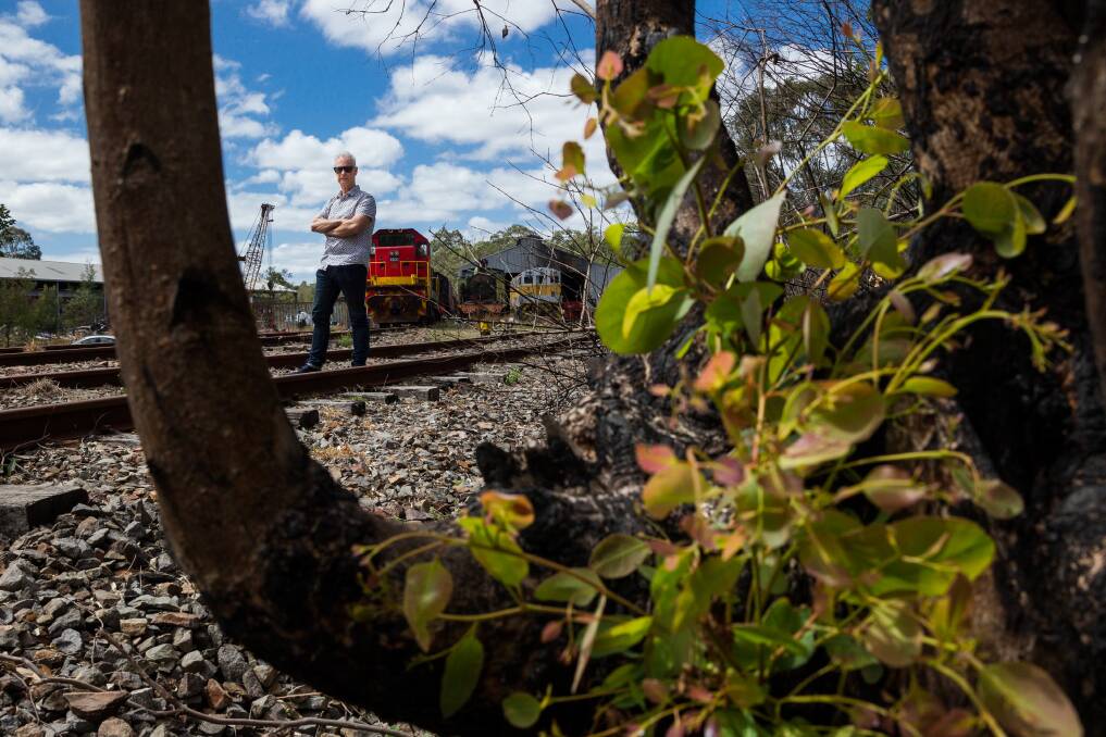 In the line of fire: Chris Richards fears a bushfire at North Rothbury could wipe out an extensive train collection and threaten homes. Picture: Max Mason-Hubers 