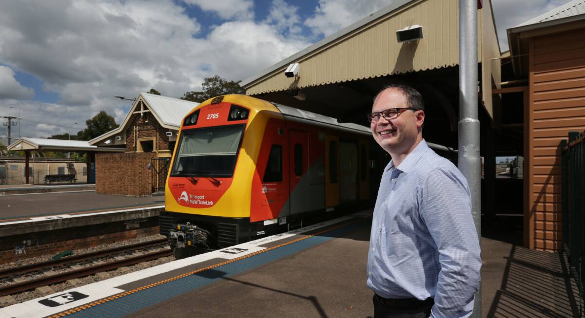 Getting on track: Chairman of the Newcastle Supercars Supporters Club, Cr Mitchell Griffin, at Maitland train station. Picture: Simone De Peak