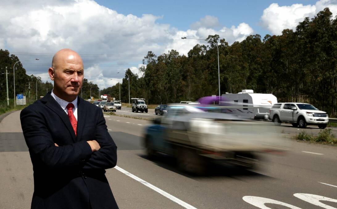 Shortfall: NRMA president Kyle Loades wants federal government funding fast-tracked to address the combined $154 million backlog for safe road infrastructure throughout the Hunter. Picture: Jonathan Carroll.