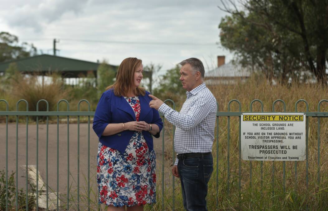 Concerned: Jenny Aitchison and shadow minister for lands Mick Veitch, who said the government "must clean this mess up - it's just not acceptable for the community". The site has not been used since 2014. Picture: Simone De Peak