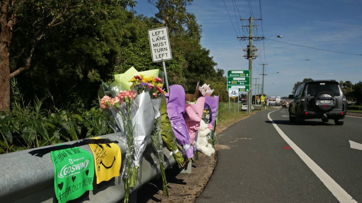 REST IN PEACE: Flowers were left by the road on Friday where Coal Point teen Jade Frith was hit by a car. Picture: Simone De Peak