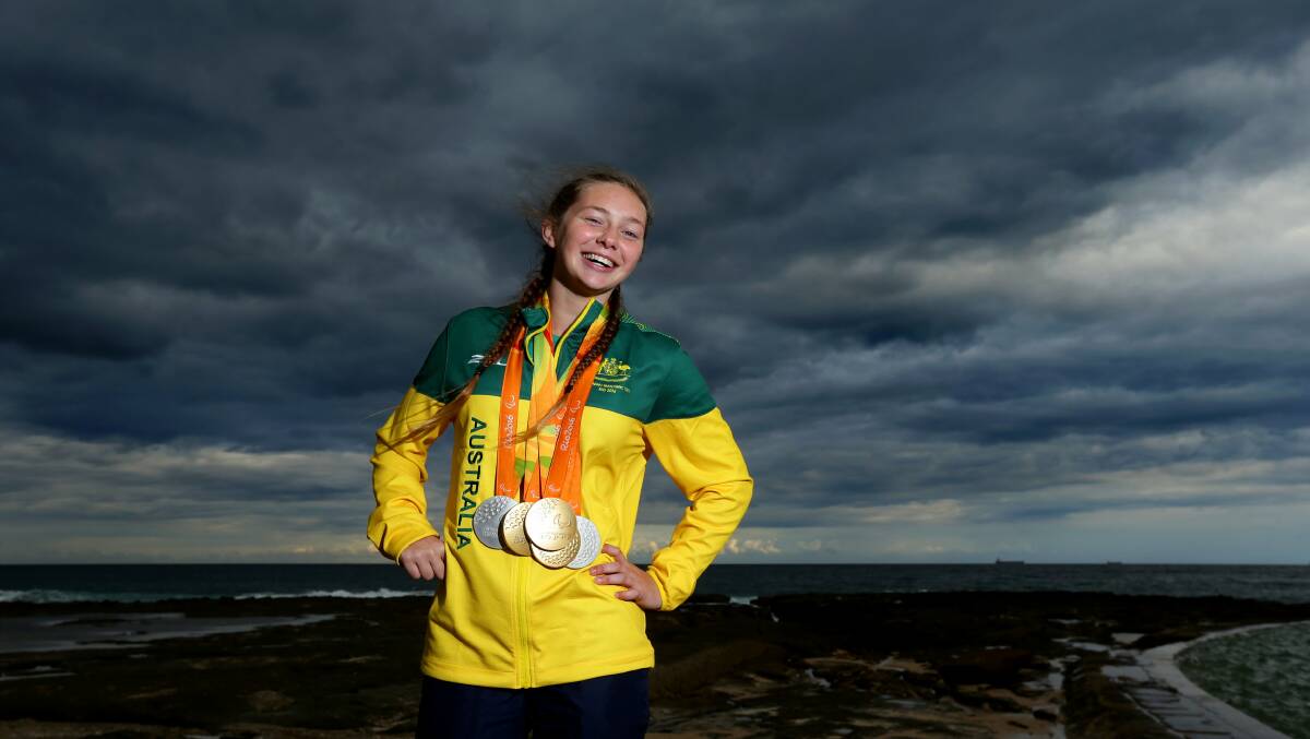 WORLDS: Hunter swimmer Maddi Elliott at home with her medal haul after last year's Paralympics in Rio. Picture: Jonathan Carroll