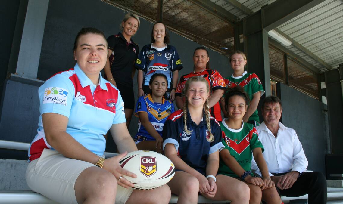 KICK OFF: Stockton's Tamara Towers seated with Jenna Brown (Beresfield), Cody Campbell (South Lakes Roosters), Ayesha Le Rougetel (Wests) and CRL operations manager Bert Lowrie. Standing is CRL women's participation officer Kylie Hilder, Elizabeth Farmer Edwards (Glendale), Melissa Opie (Cardiff) and Tia Jackson (Wests). Picture: Josh Callinan