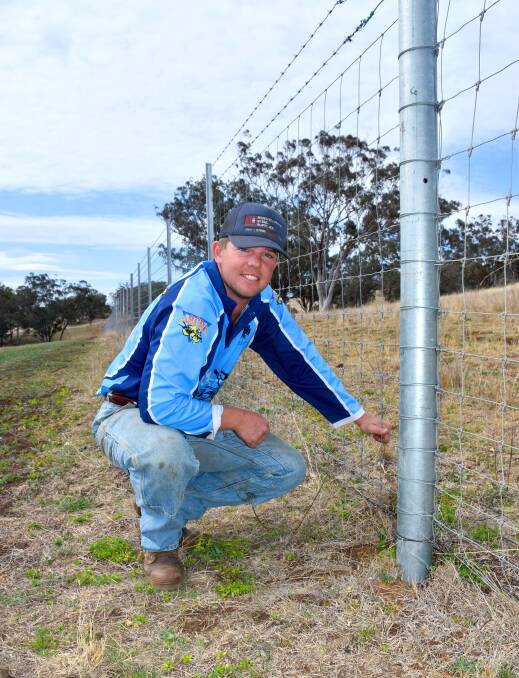 NO GO: Tom Hunt, manager, "Inverary' Kar Springs near Scone with the first exclusion fence built on the property to keep out deer and kangaroos.