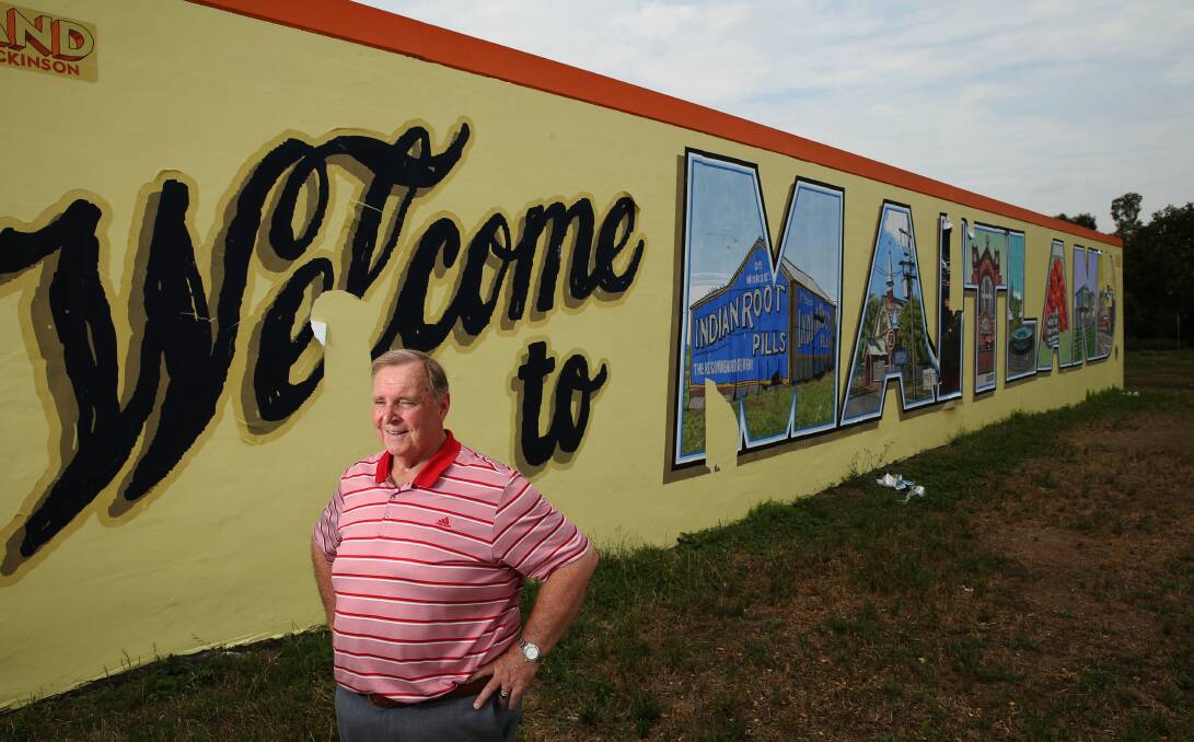 BIG CHANGES: Maitland councillor Henry Meskauskas posing for a picture in front of a mural by Trevor Dickinson near Maitland Train Station. Picture: Max Mason Hubers
