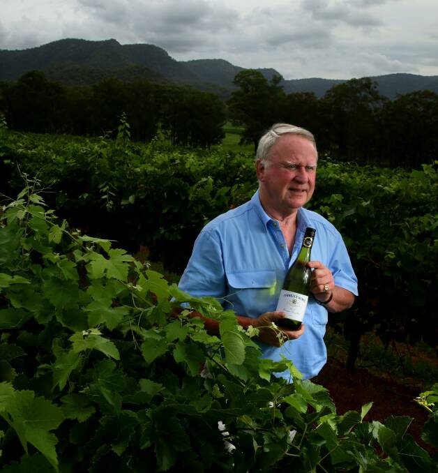 CHEERS: Bruce Tyrrell from Tyrrell's Wines with a bottle of the Wine of the year - Vat No 1 Hunter Semillon 2009. Picture: JONATHAN CARROLL