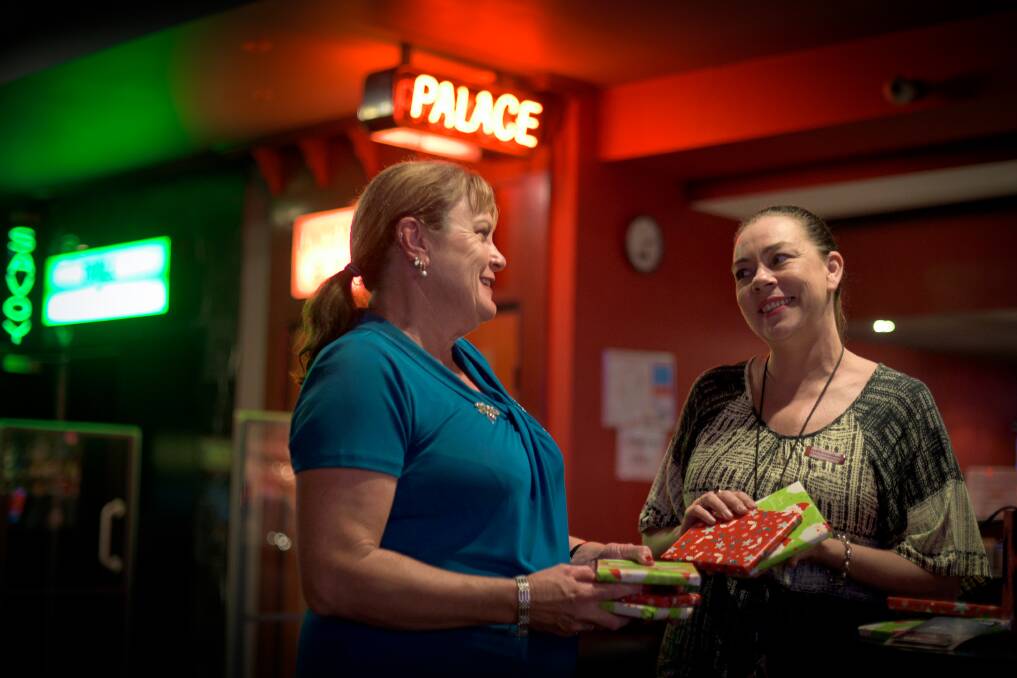 PARTNERSHIP: Carrie's Place's Jenny Harland and Maitland cinema's Yvette Cavanagh with gifts for children under the service's care. Picture: Perry Duffin