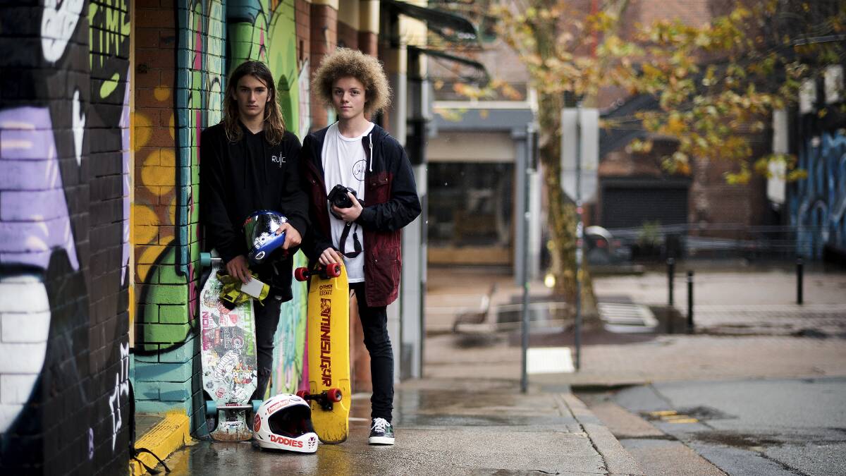 Cinematic moves: Filmmaking Newcastle skateboarders Aidan Essex-Plath and Max Cooper, who post videos on YouTube as East Enders. Picture: Perry Duffin