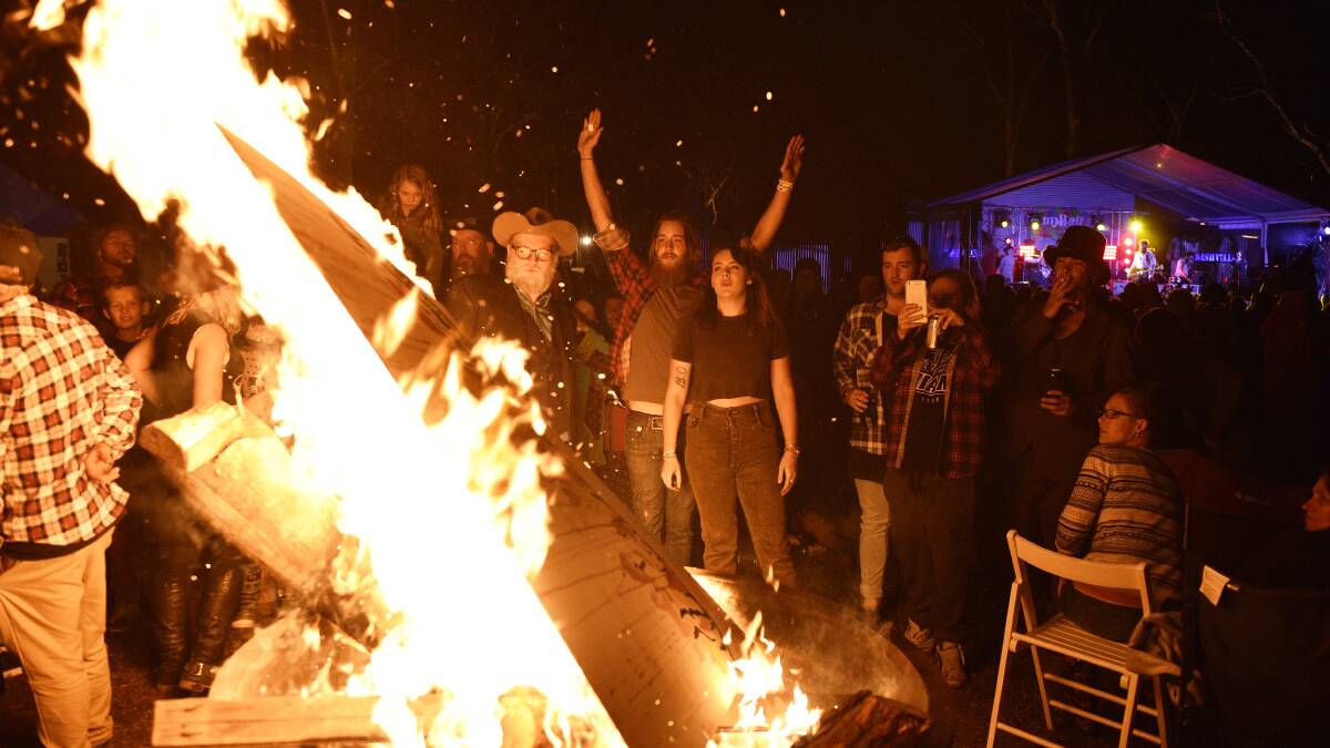 RELEASE: William Crighton's band and Indeah Clark throw her art on a bonfire at the Gumball. Picture: Perry Duffin
