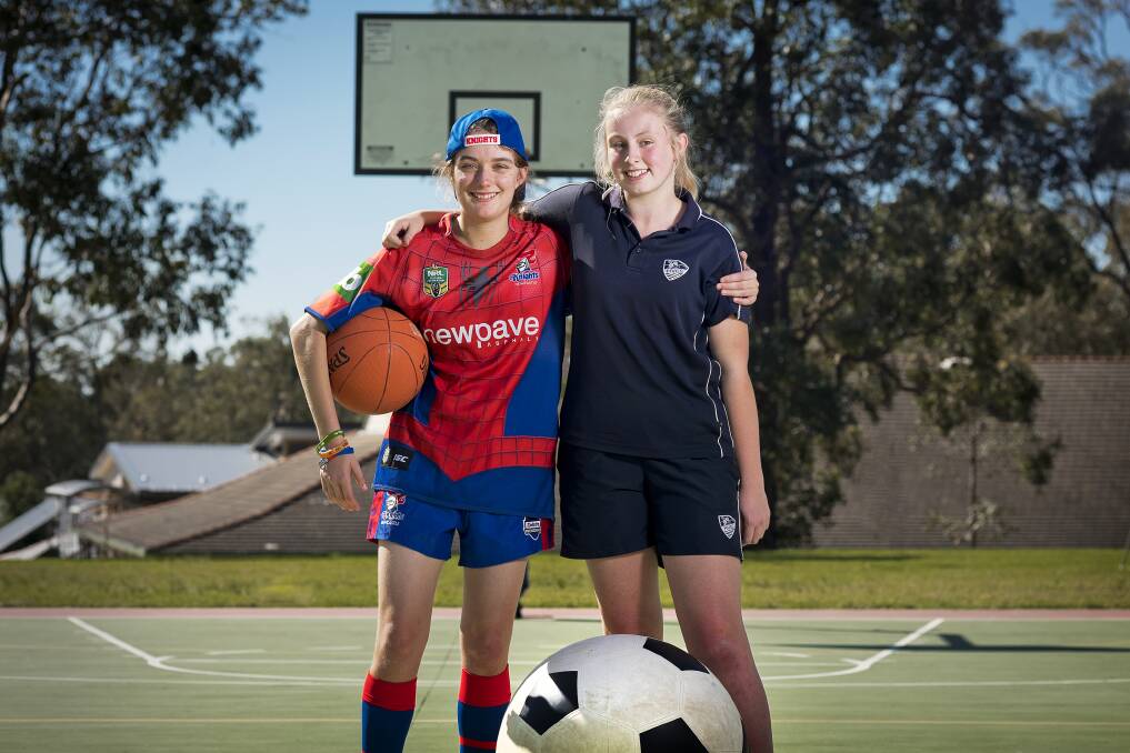 STAND TOGETHER: Michelle Price and Alex Gibb playing sport at Hunter Valley Grammar School on Tuesday. Picture: PERRY DUFFIN