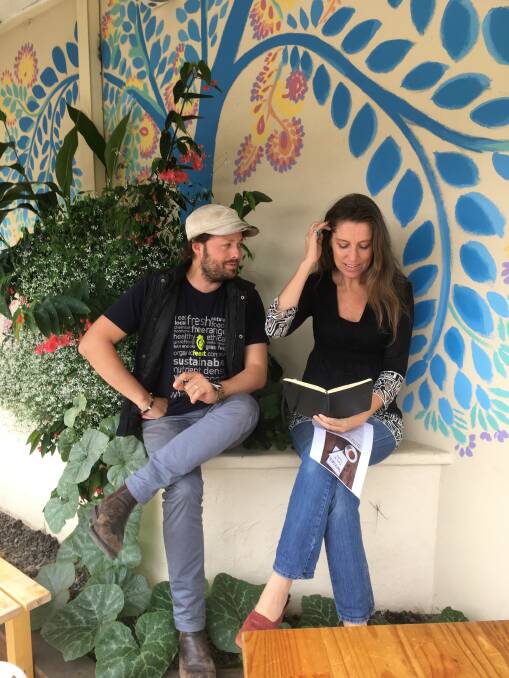 POETIC: Organic Feast's Joseph Stuart and Maitland's first poet in residence Gillian Swain. Poets are being invited to perform their craft in the city's cafes. Picture: Supplied
