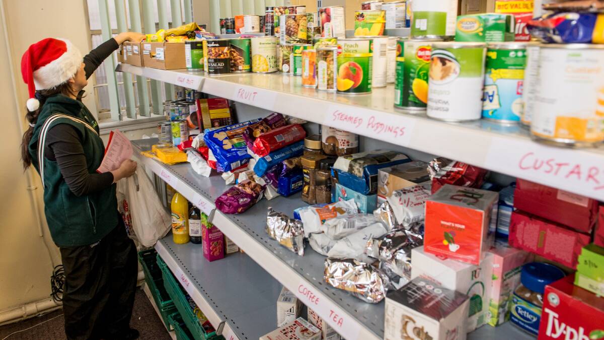 TOUGH TIMES: Hundreds of people will request a Christmas food hamper in Maitland this year. But Maitland Neighbourhood Centre said limited resources, staff and rising demand means less than half of those who need help will recieve it. Photo: Richard Stonehouse/Getty Images