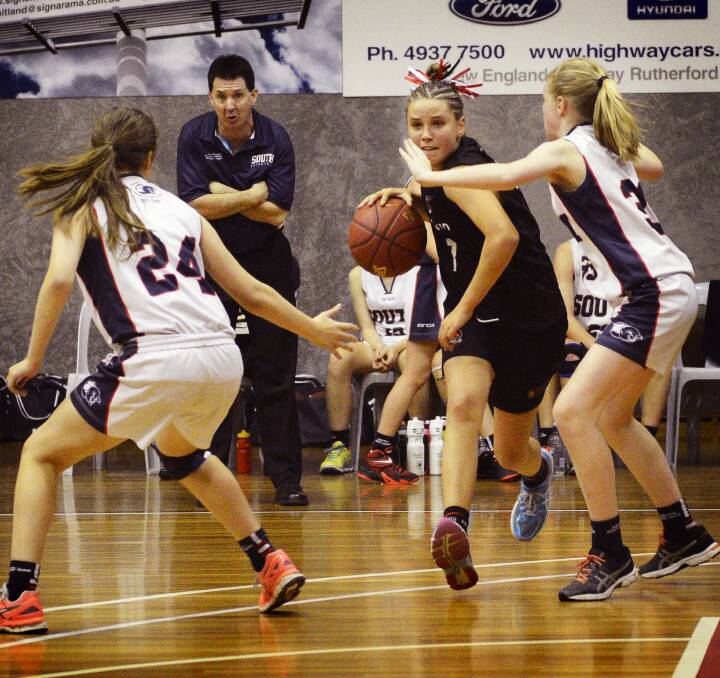 ELITE COMPANY: Maitland's Sophie Williams attempts to drive the ball into the key against South Adelaide Panthers at the Maitland Federation Centre. Picture: Michael Hartshorn