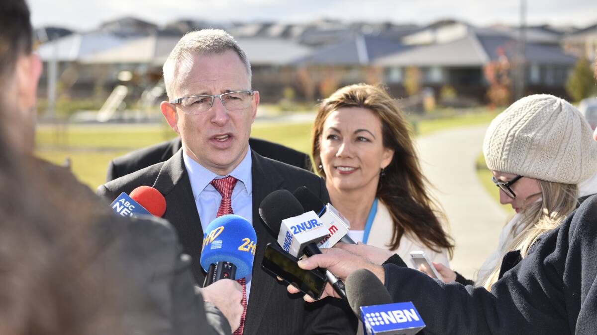 FUNDED: Minister for Major Projects Paul Fletcher and Liberal candidate for Paterson Karen Howard announce $15m to fix Cessnock Road at Testers Hollow. Picture: PERRY DUFFIN