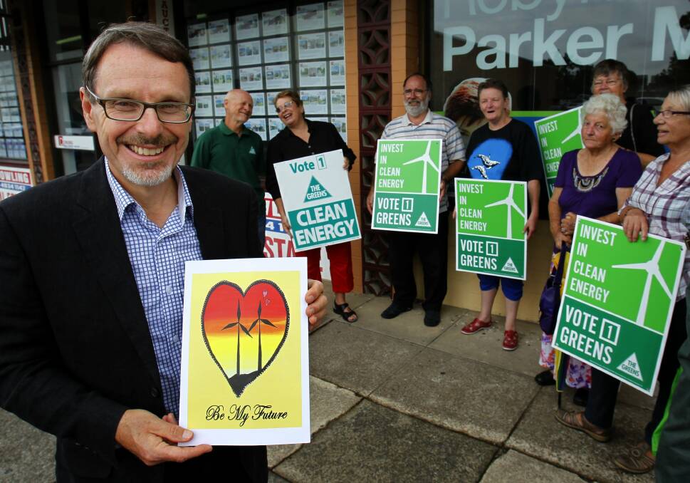 Vale: NSW Greens MP John Kaye outside the then Environment Minister Robyn Parker's Maitland office to deliver a clean energy message supporting wind farms.