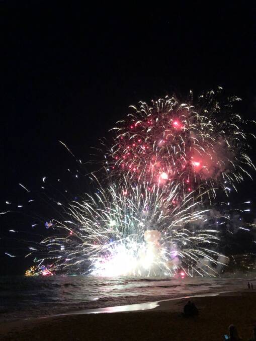 Explosion: The moment a barge-mounted New Year's Eve fireworks display at Terrigal turned into an explosion that left revellers running from the beach. 