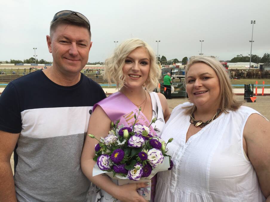PROUD MOMENT: Maitland Showgirl 2018 Caitlin Hipwell with parents Stacey and Steven at the showground.