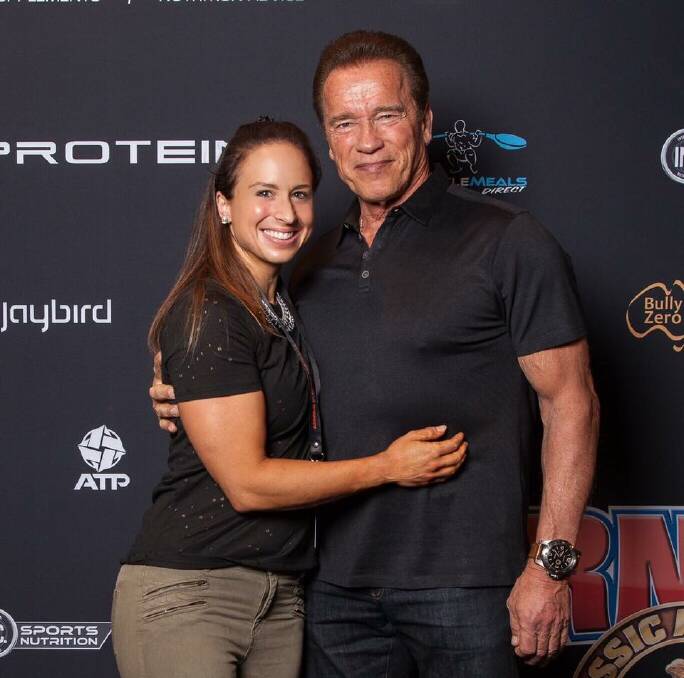 HONOURED: Anytime Fitness Muswellbrook club manager Anna Periscal with Arnold Schwarzenegger at the Arnold Classic in Melbourne.