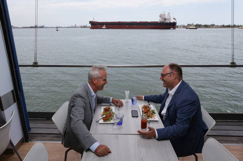 WATER WORLD: Hunter Water managing director Jim Bentley at lunch by the harbour with Scott Bevan. Picture: Jonathan Carroll
