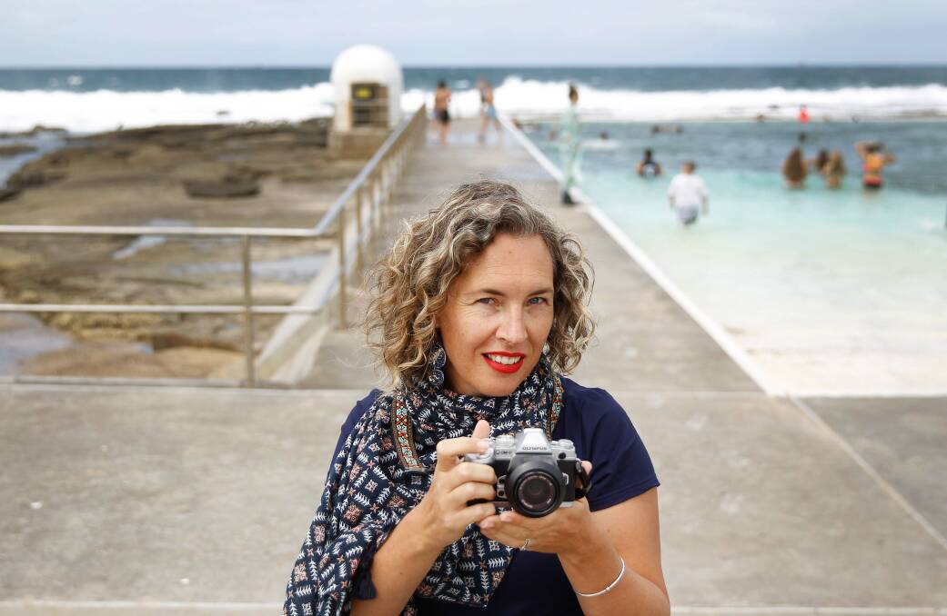CLOSE UP: Photographer Brydie Piaf at Merewether Ocean Baths, which she has been recording through her lens. Pictures: Marina Neil