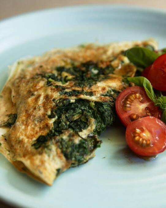 Serve Jill Dupleix's egg white and spinach omelette with a tomato and salad <a href="http://www.goodfood.com.au/good-food/cook/recipe/egg-white-omelette-with-spinach-20121123-29va9.html"><b>(RECIPE HERE)</b></a>. Photo: Jennifer Soo