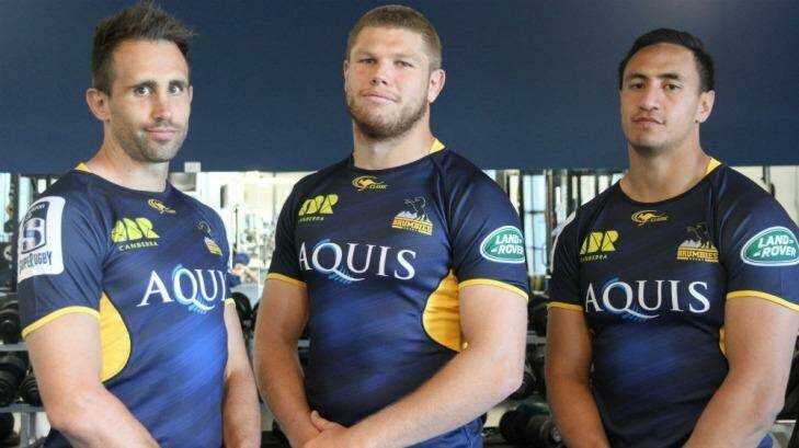 Andrew Smith, Blake Enever and Lausii Taliauli show off the Brumbies new 2016 home jersey. Photo: Supplied
