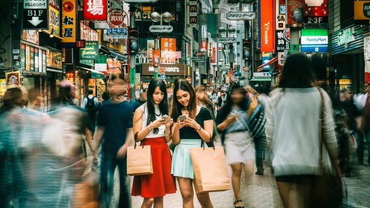 Japanese girls hanging out on Shibuya streets of Tokyo.  Photo: ferrantraite