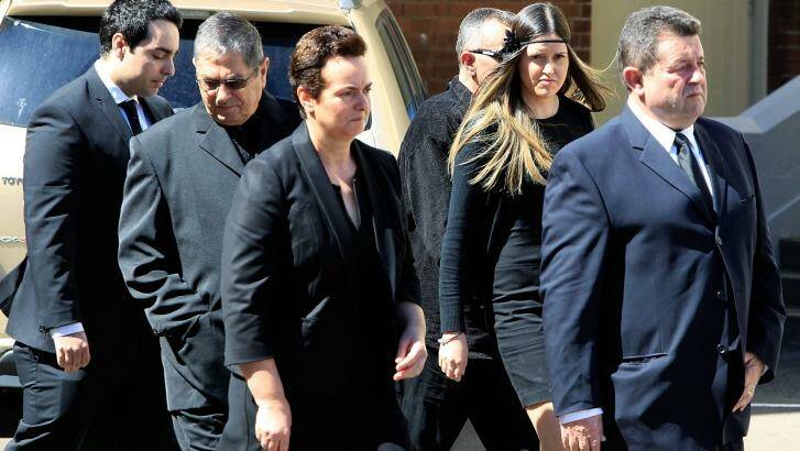 Relatives of the Rozelle blast victims Bianka and Jude O'Brien arrive for the funeral service.  Photo: Daniel Munoz