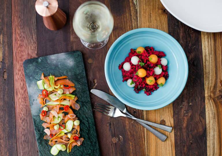 Anason's colourful take on Turkish street food includes salmon pastirma with zucchini and chilli as well as  beetroot with cracked wheat kisir and melon balls. Photo: Supplied