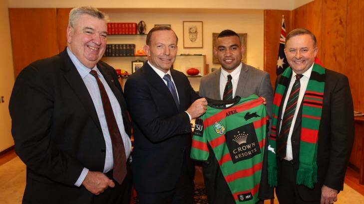 Holding court: Richardson with Prime Minister Tony Abbott, Nathan Merritt and Souths tragic Anthony Albanese. Photo: Andrew Meares