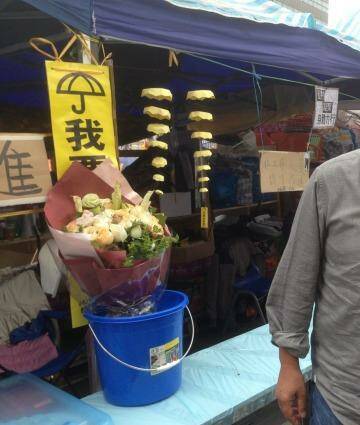 "I want genuine universal suffrage" reads the umbrella sign at Hong Kong Media magnate Jimmy Lai's tent.  Photo: Charmaine Chan