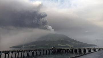 Mount Ruang erupted at least five times on Wednesday, causing authorities to issue their top alert. (AP PHOTO)