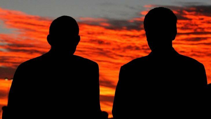 Tony Abbott and Bill Shorten attended a dawn vigil for Andrew Chan and Myuran Sukumaran yesterday.  Photo: Alex Ellinghausen