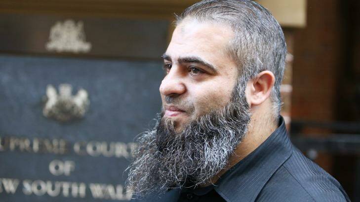 Hamdi Alqudsi, who is accused of recruiting people to fight with terrorists overseas, leaves the NSW Supreme Court after a change in his bail conditions. Photo: Daniel Munoz