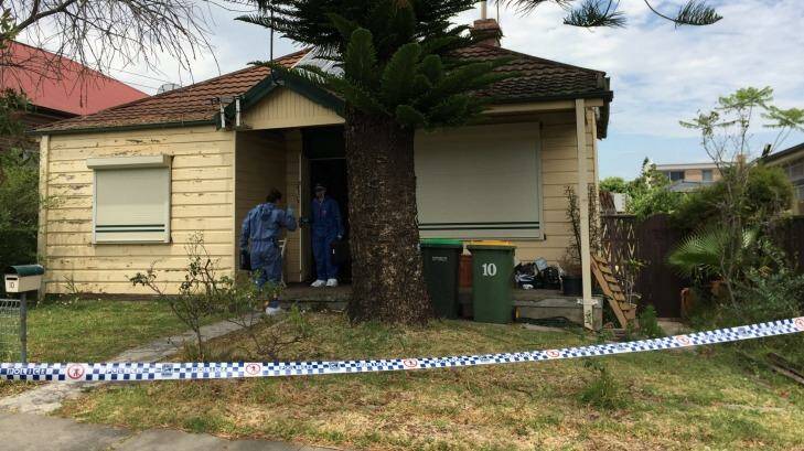 Police search for the body of missing schoolgirl Quanne Diac at a house in Granville on Monday morning. Photo: Nick Ralston