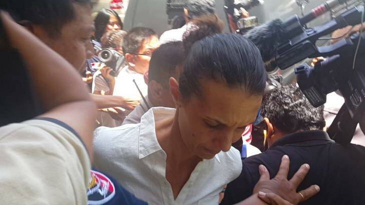 Sara Connor is jostled as she is taken from the Denpasar prosecutor's office to Kerobokan jail on Monday. Photo: Amilia Rosa