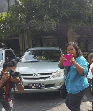 Julaikah Noor Aini  goes to meet her son John, in Bali. Photo: Amilia Rosa