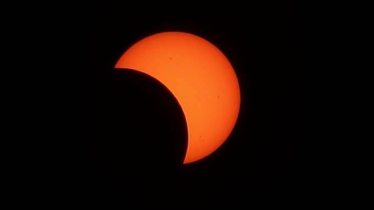 Partial solar eclipse. Photo: Jim Katsifolis