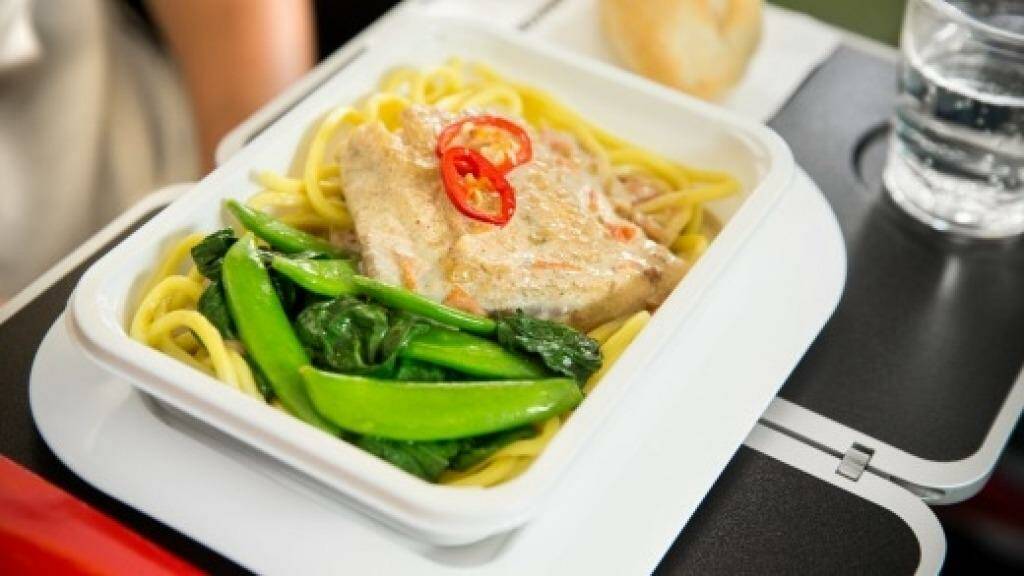 Barramundi poached in spiced coconut sauce with noodles – one the new Qantas economy class meals.  Photo: Supplied