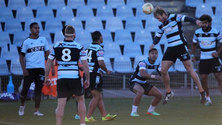 Heading for a resolution: Cronulla players train yesterday.  Photo: John Veague