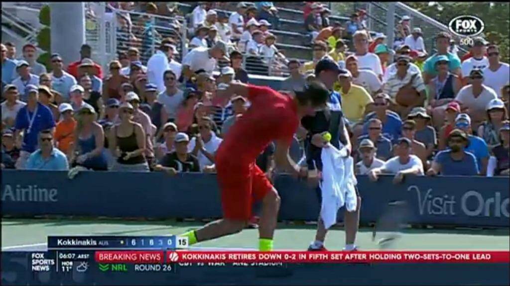 Thanasi Kokkinakis throws his racquet into the ground in frustration. Photo: Screengrab