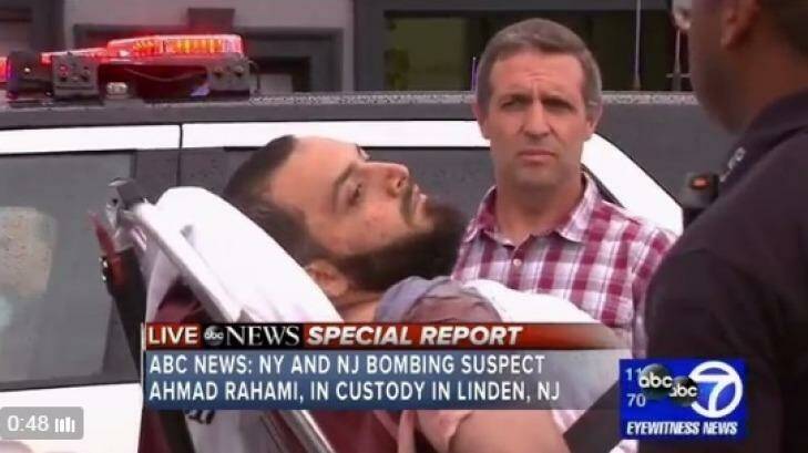 Ahmad Rahami being taken into police custody on a stretcher. Photo: Screenshot ABC News
