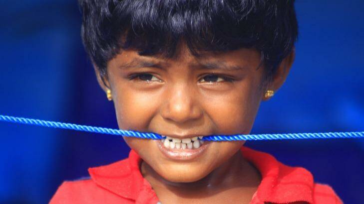 A Sri Lankan child in Aceh.  Photo: Fadly
