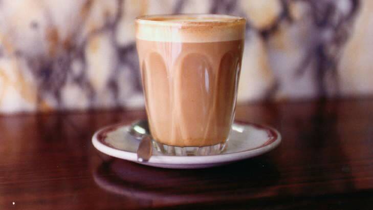 Why do some people prefer their latte in a glass? Photo: Wayne Ludbey